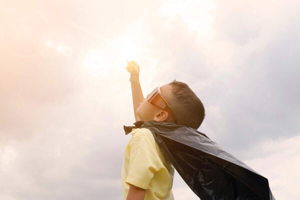 Boy in hero costume